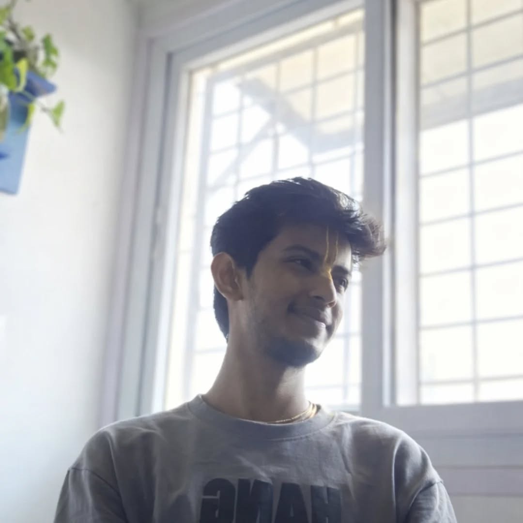 Casual portrait of Anish by a window